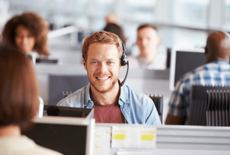 Male worker in contact centre